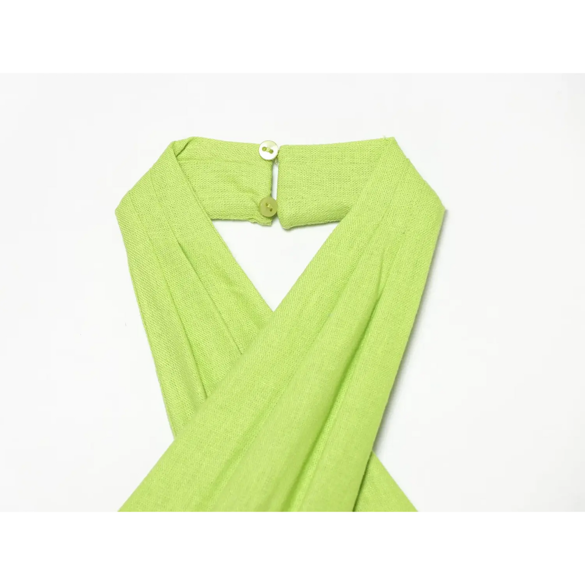 Close-up of lime green back neck button and halter strap