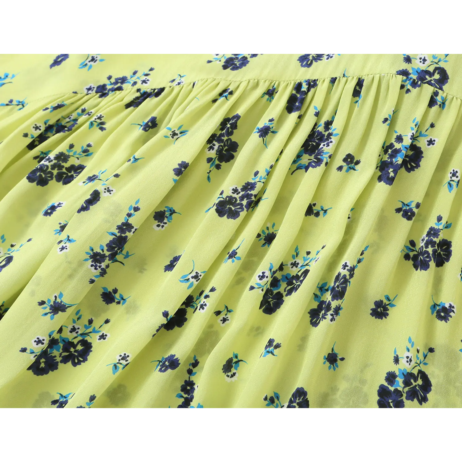 Close‑up back gathered pleated fabric detail on lime green navy floral women blouse