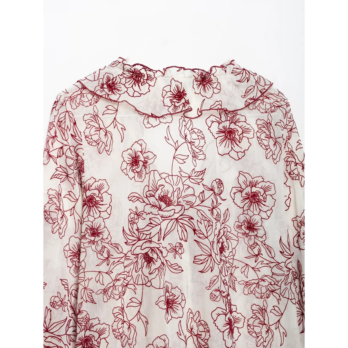 Close-up of back neckline ruffle detail