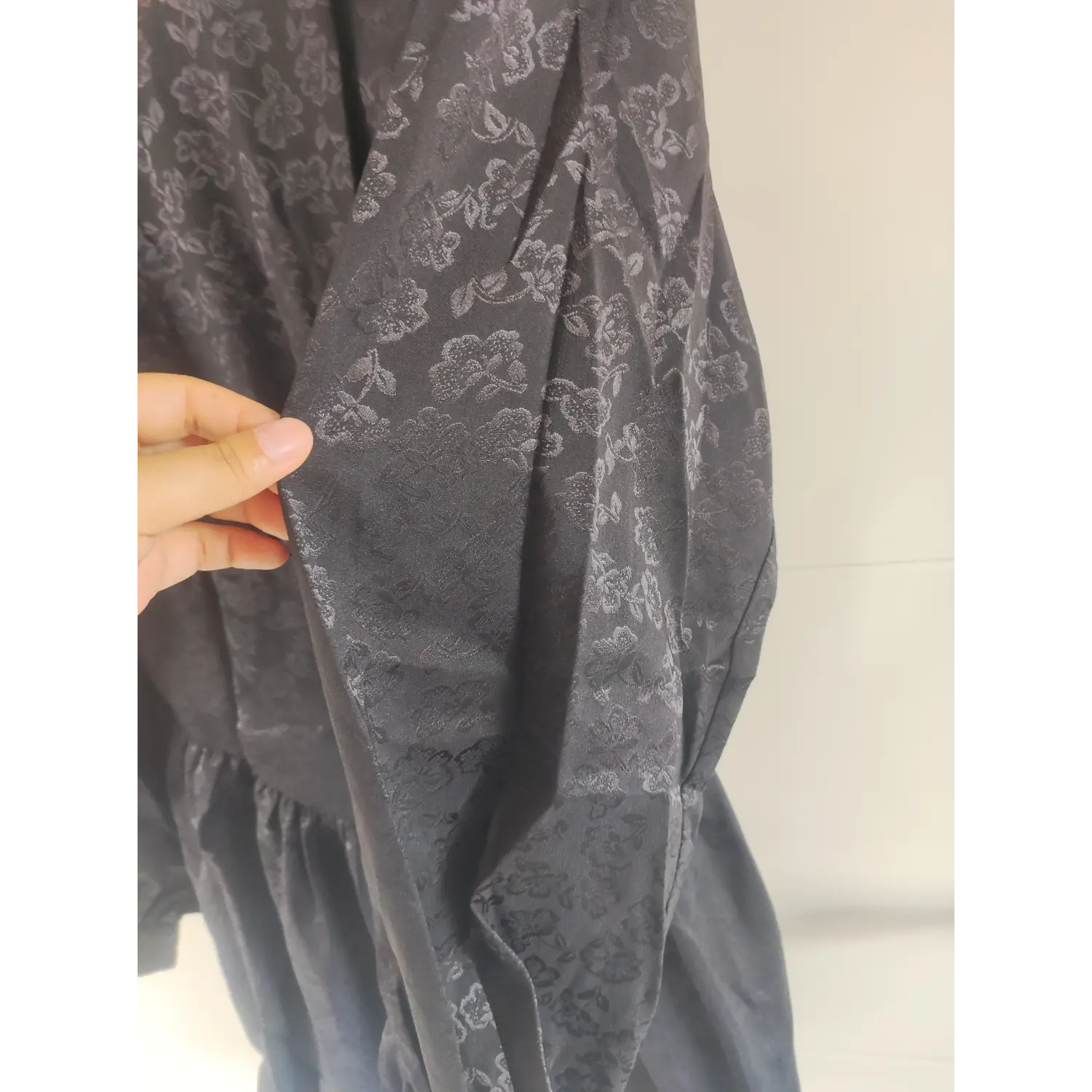 Fabric texture close-up, matte sheen black allover floral jacquard long sleeve | Detail