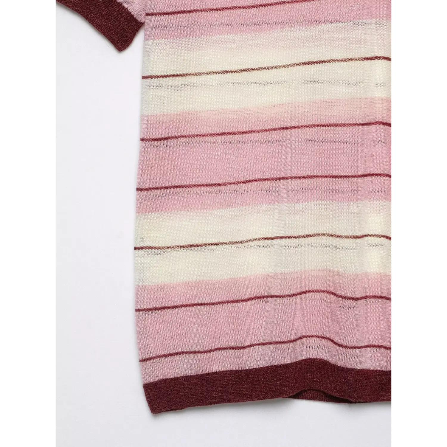 Lower torso partial shot, continuous horizontal stripe knit, maroon ribbed bottom hem finish