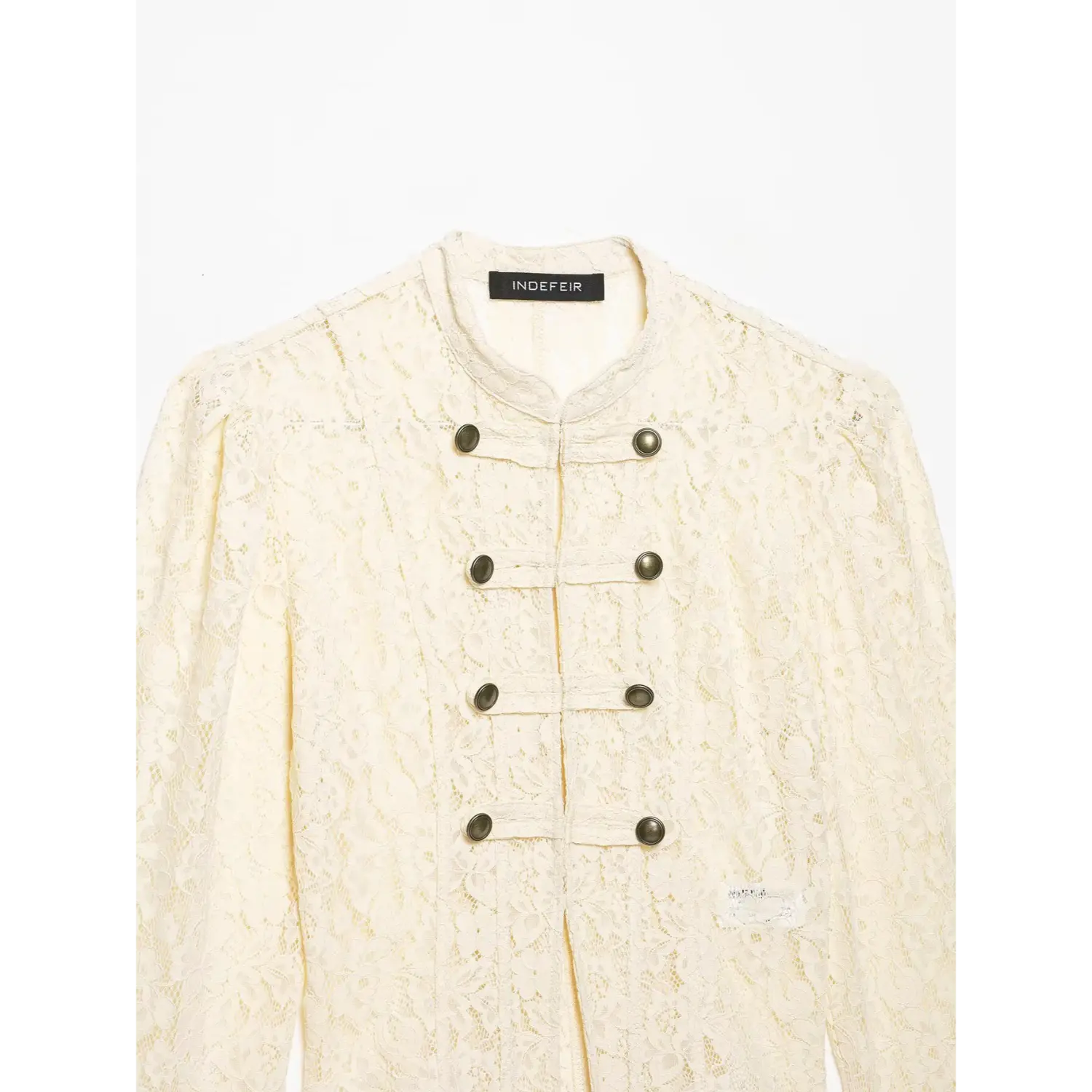 Closeup mandarin collar lace jacket, antique brass double row buttons, floral hollow lace fabric