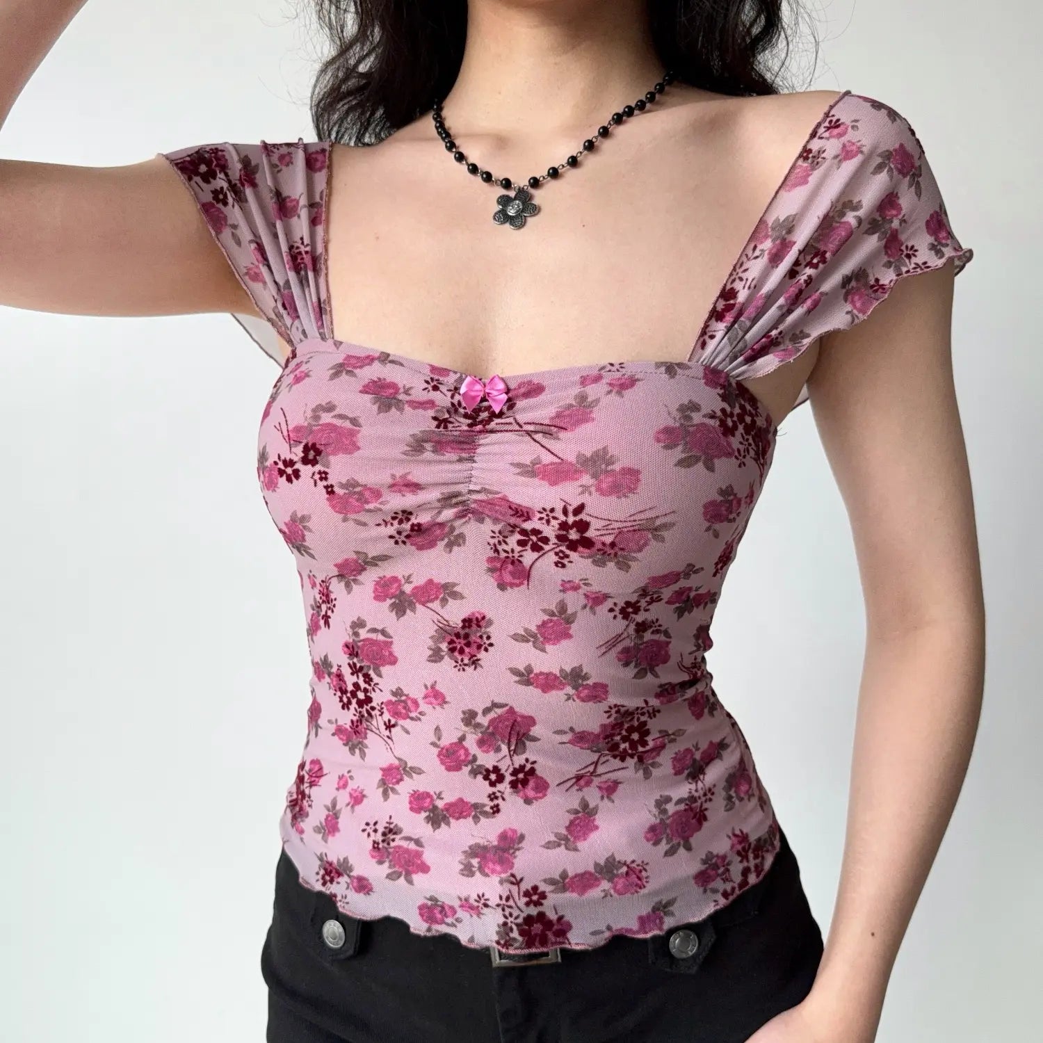 Front lifestyle shot on model of mauve floral mesh blouse, square neckline, chest gathering detail, fitted everyday short sleeve top