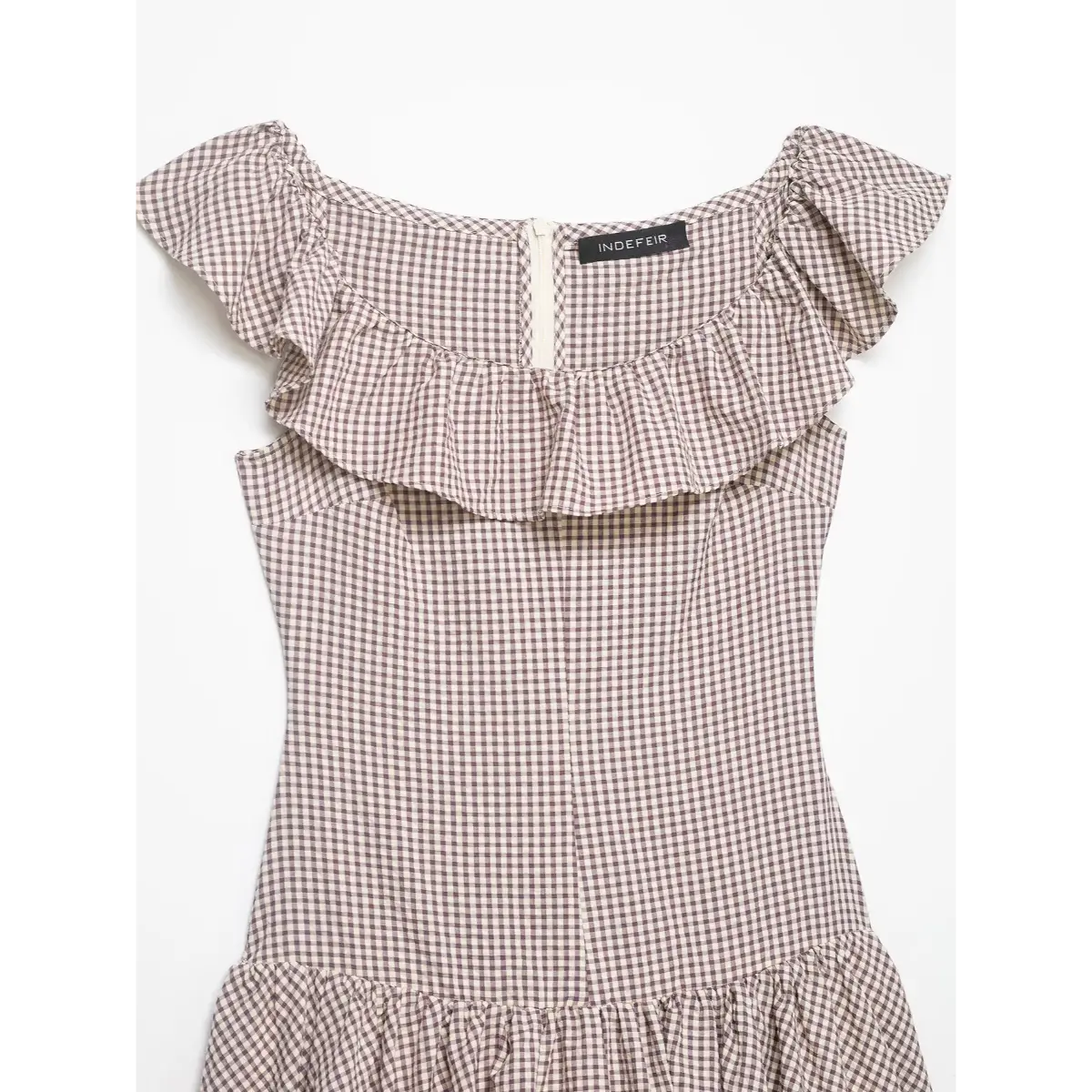 Front view of the mauve gingham dress, showing the ruffled off-the-shoulder neckline, fitted bodice, and tiered skirt