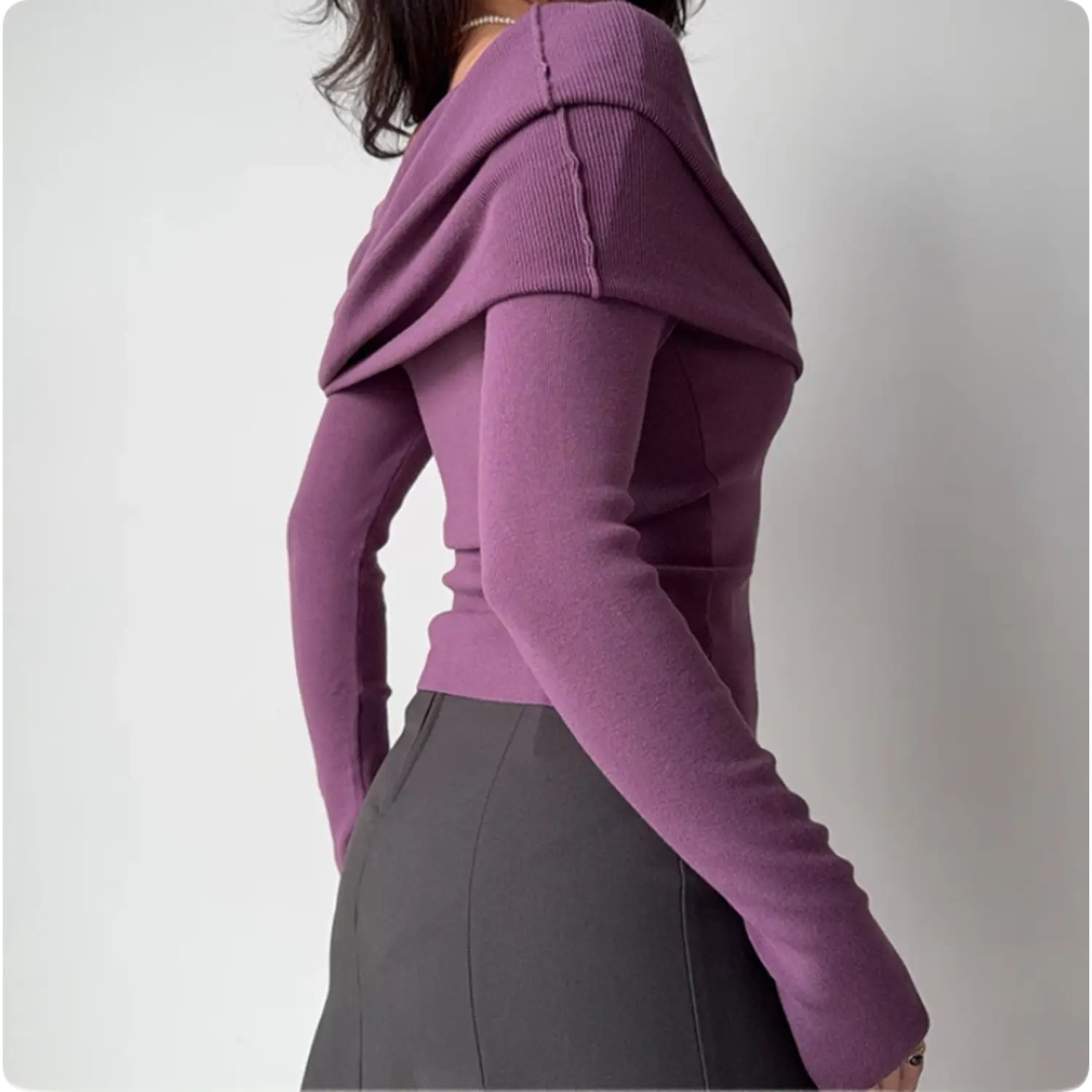 Side back view of mauve purple ribbed off shoulder fitted knit top, folded wide neck long slim sleeve women classy blouse