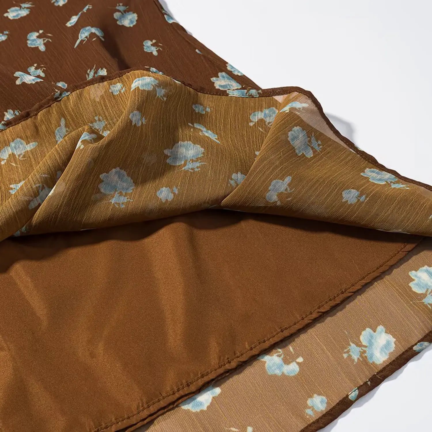 Skirt hem double layer partial shot, sheer floral outer chiffon + opaque solid brown inner lining