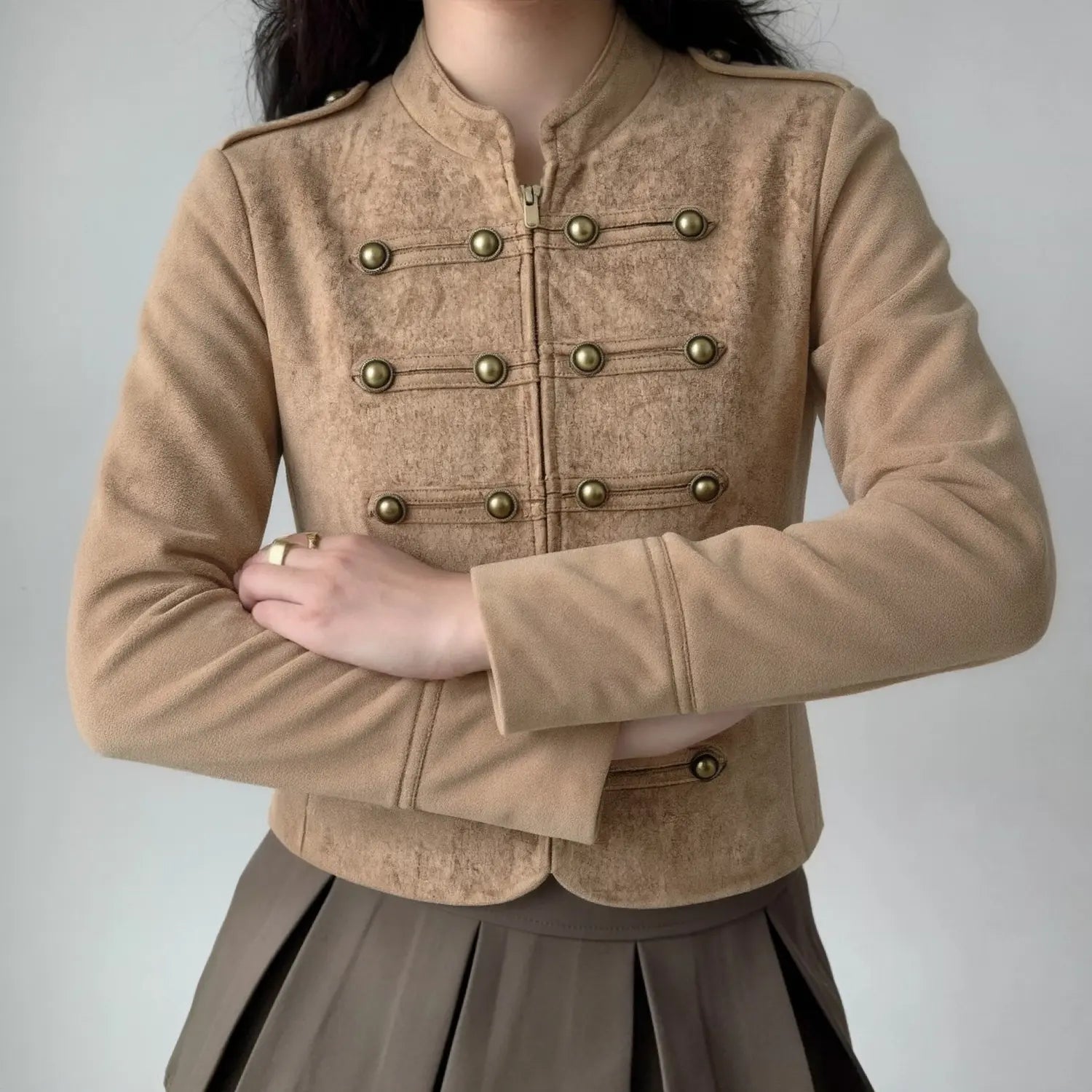 Model wearing khaki faux suede military cropped jacket, lifestyle front outfit shot