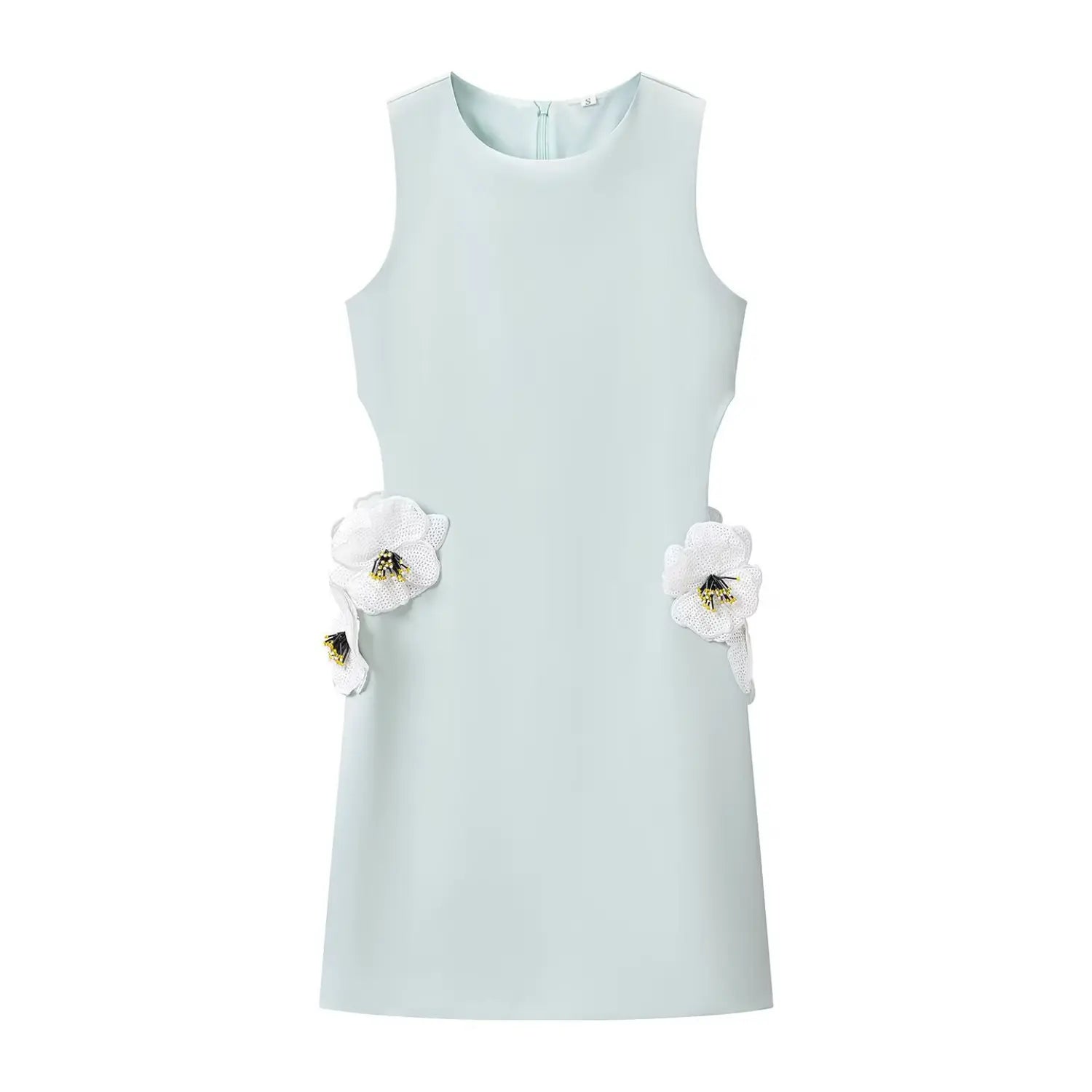 Flat lay shot of the mint green sleeveless dress, showing the front design with two floral appliqués at the waist