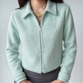 Model wearing mint green collared tweed zip-up cropped jacket daily outfit front view