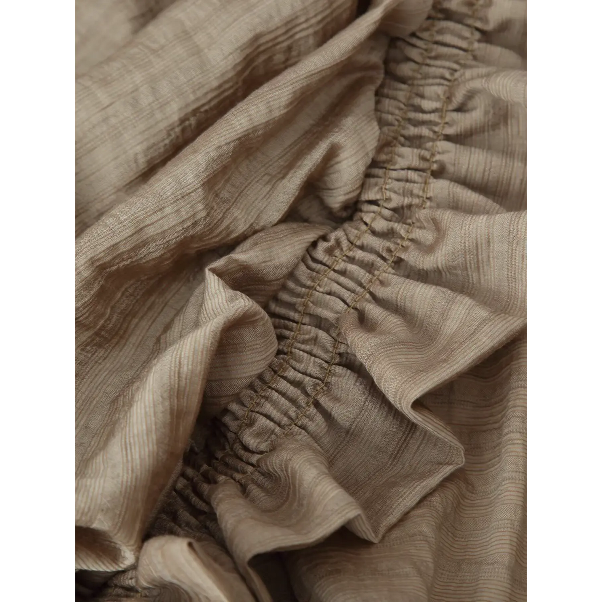 Close-up of smocked ruffle detail