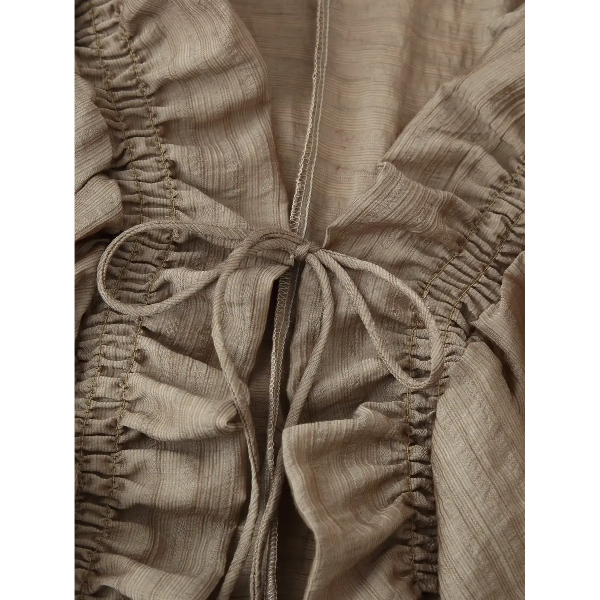 Close-up of front tie string