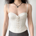 Woman model wearing white satin sweetheart corset camisole with front Chinese frog buttons, fitted waist bustier outfit
