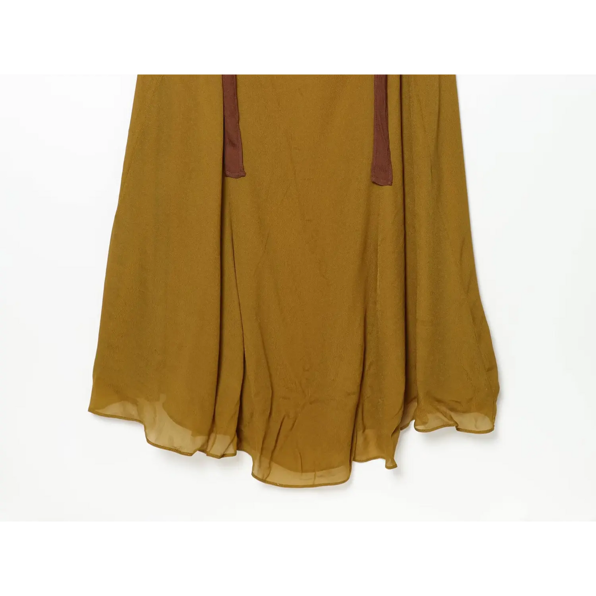 Close-up of flowing midi skirt hem