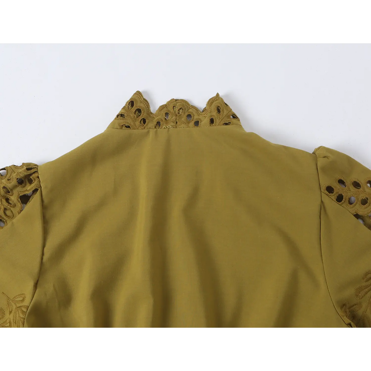 Close-up of back scalloped neckline