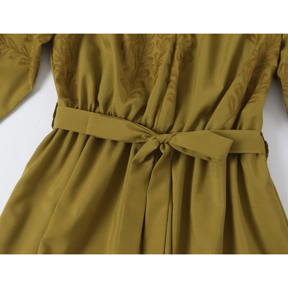 Close-up of self-tie waist bow