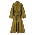 Front flat lay of mustard eyelet embroidered tie waist midi dress