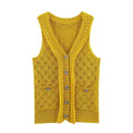 Front flat lay of mustard pointelle knit button vest