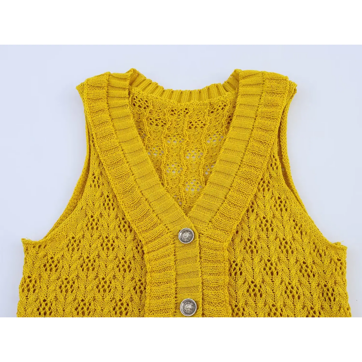 Close-up of V neck and button placket