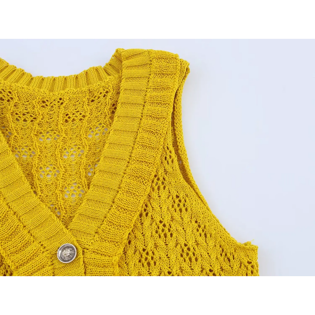 Close-up of shoulder and V neck detail