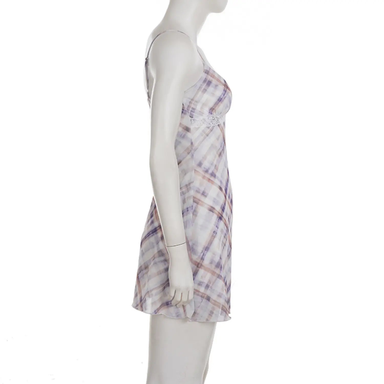 Side profile full white studio mannequin shot of A-line mesh slip mini dress, horizontal white lace underbust detail, sheer watercolor plaid outer layer with solid white lining underneath