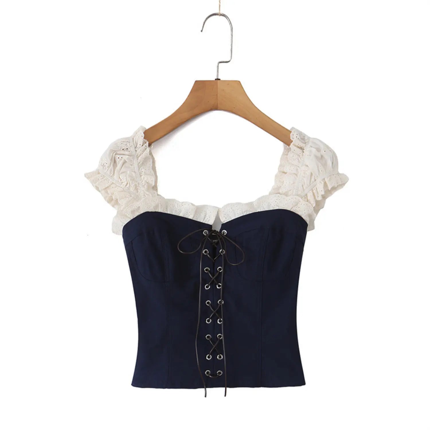 Full front view on white background of the navy blue lace-trimmed corset-style top