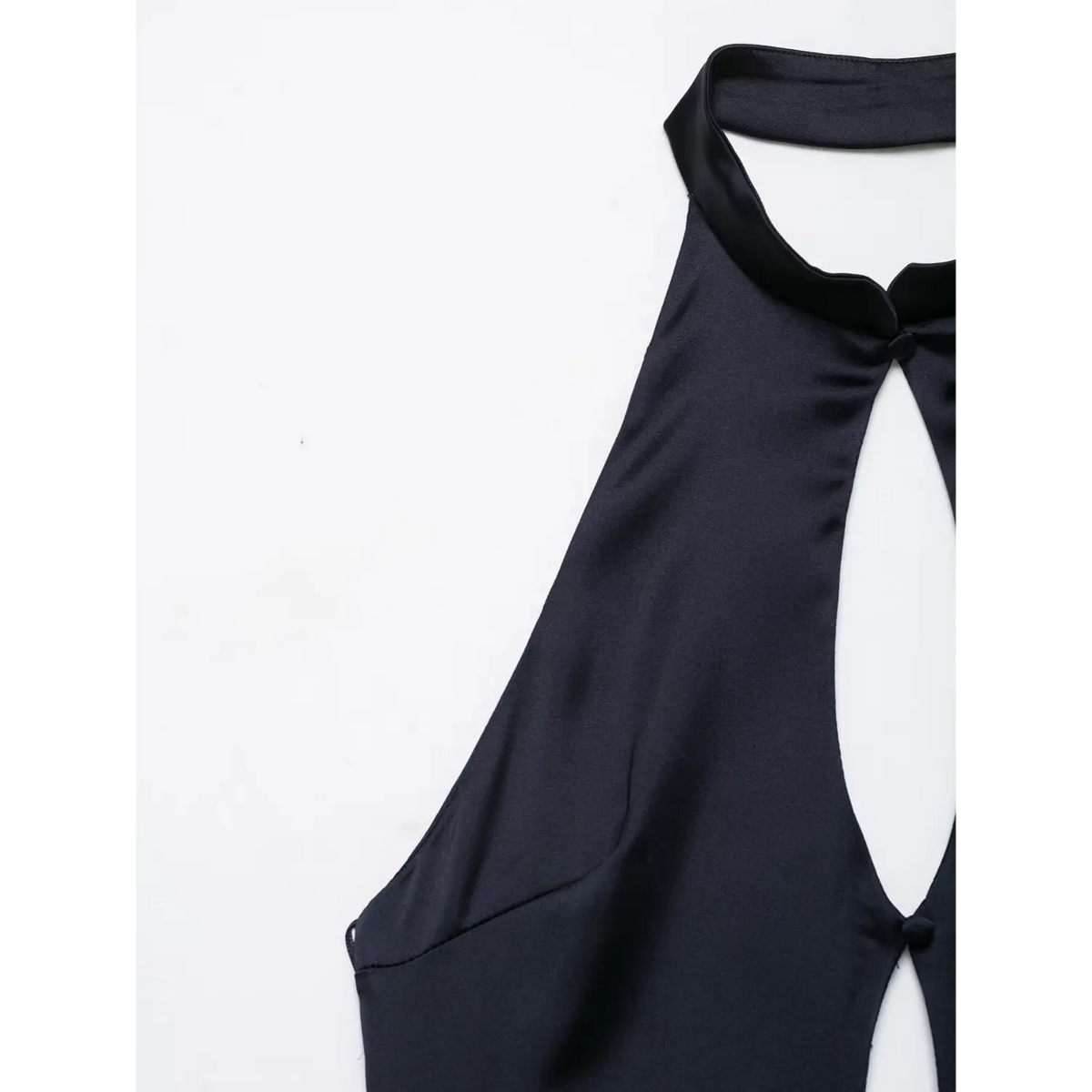 Close-up of halter neckline angle on navy blue satin dress