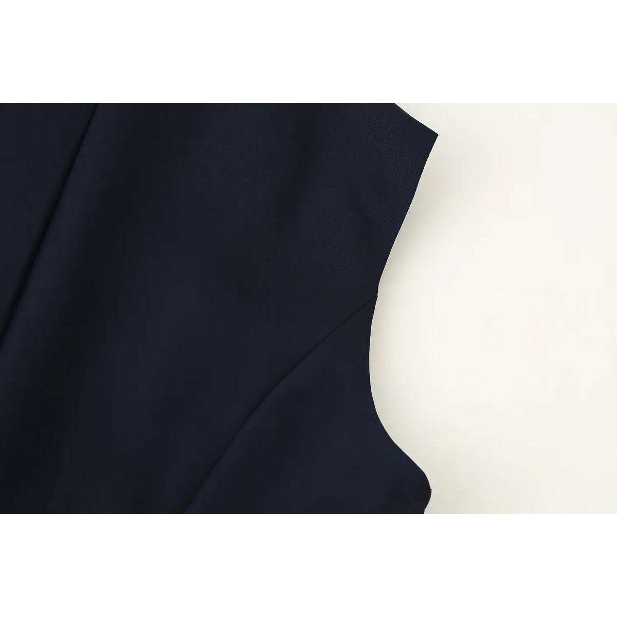 Close-up of sleeveless armhole stitching