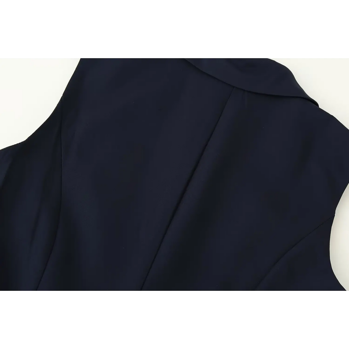Close-up of back stitching and blazer collar