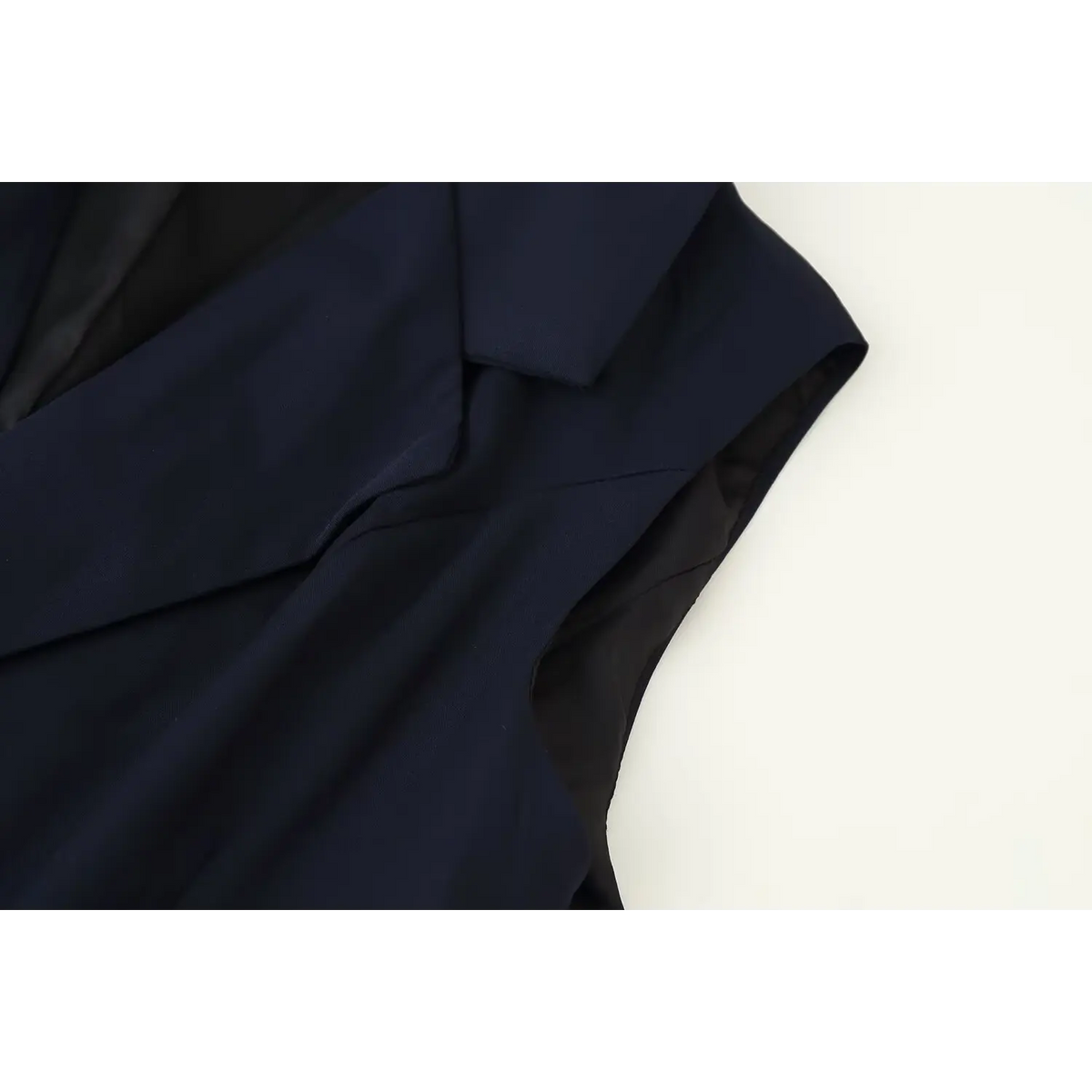 Close-up of sleeveless shoulder stitching