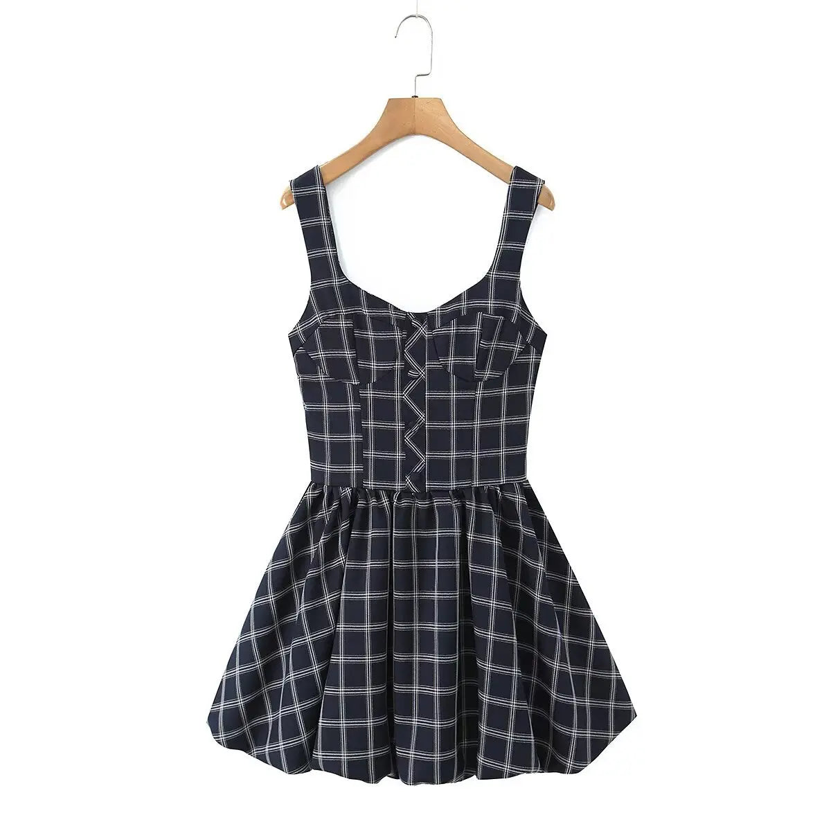 Navy blue checkered cami skater dress hanging on wooden hanger, front view