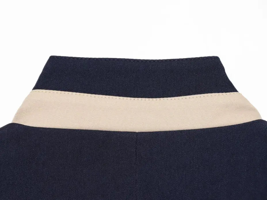 Close-up of back stand collar cream trim