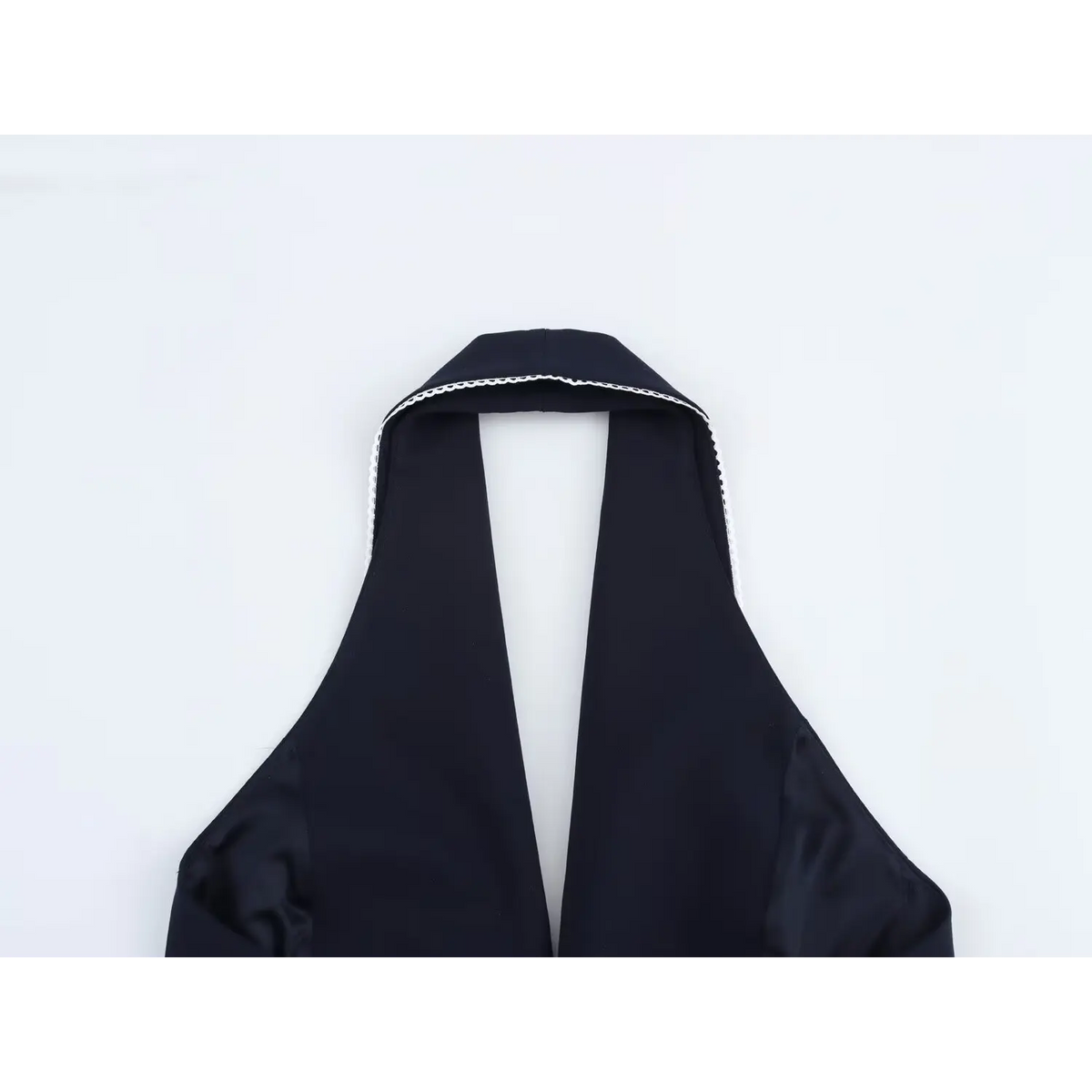 Close-up of back neckband and scallop trim