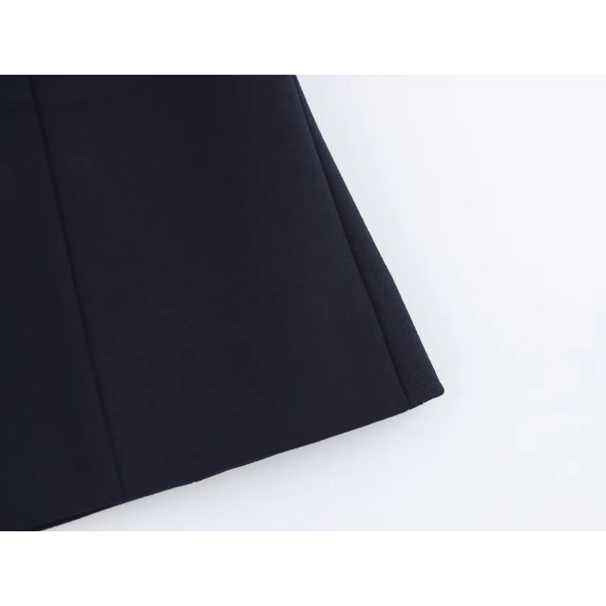Close-up of side seam and hem edge