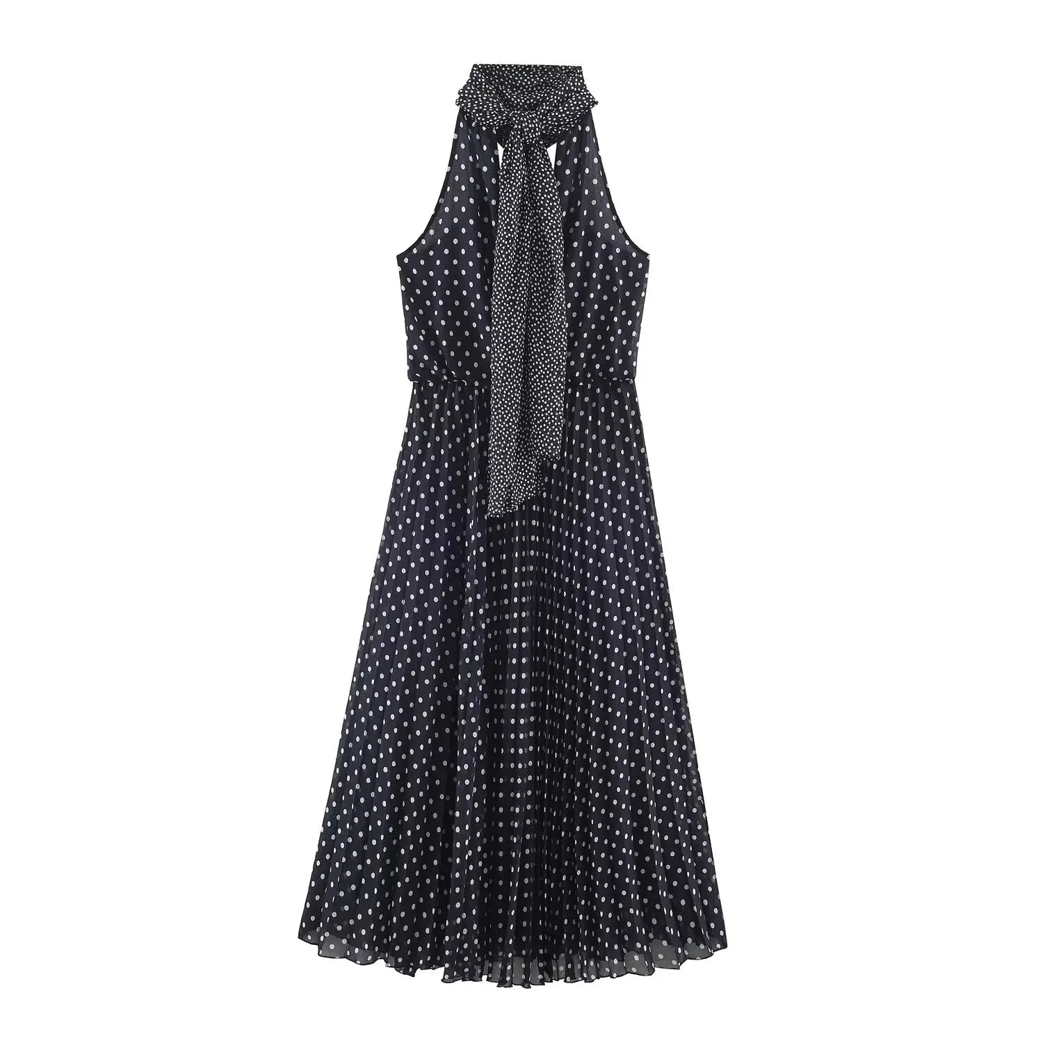 Back view navy polka dot halter maxi dress, tie‑back halter neck, flowy pleated long skirt