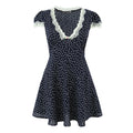 Navy white polka dot lace puff sleeve mini dress front plain white flat lay, eyelash lace V neck front flower button waist shirring A-line flare skirt french vintage short dress main hero shot