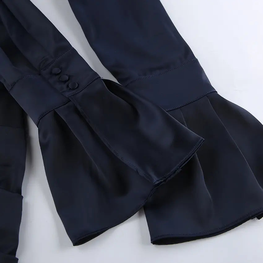 Close-up of bell cuffs