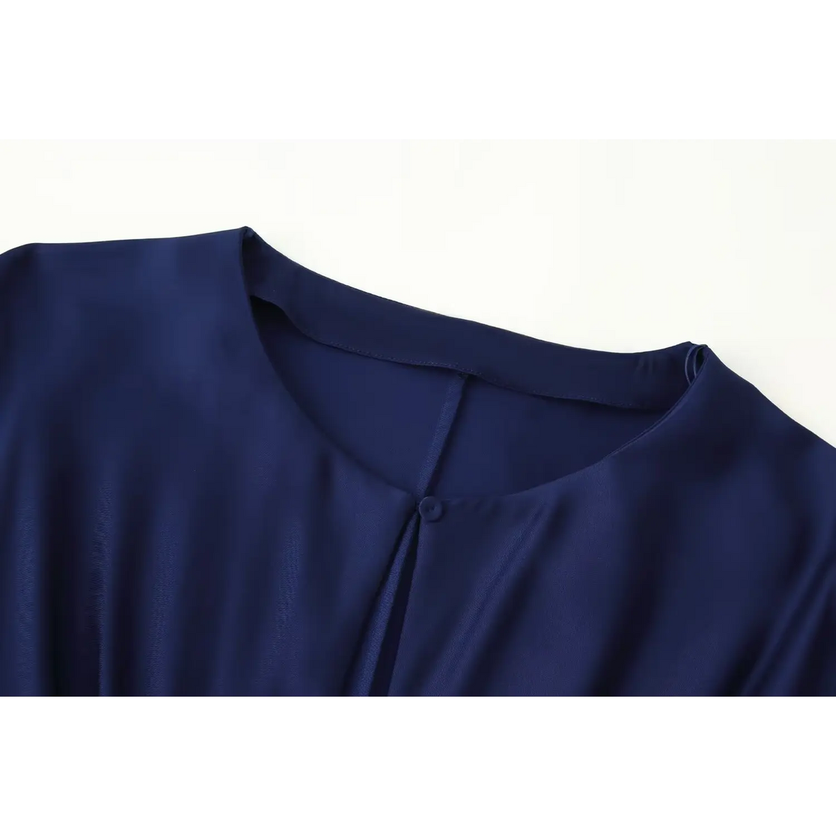 Close-up of back keyhole button closure