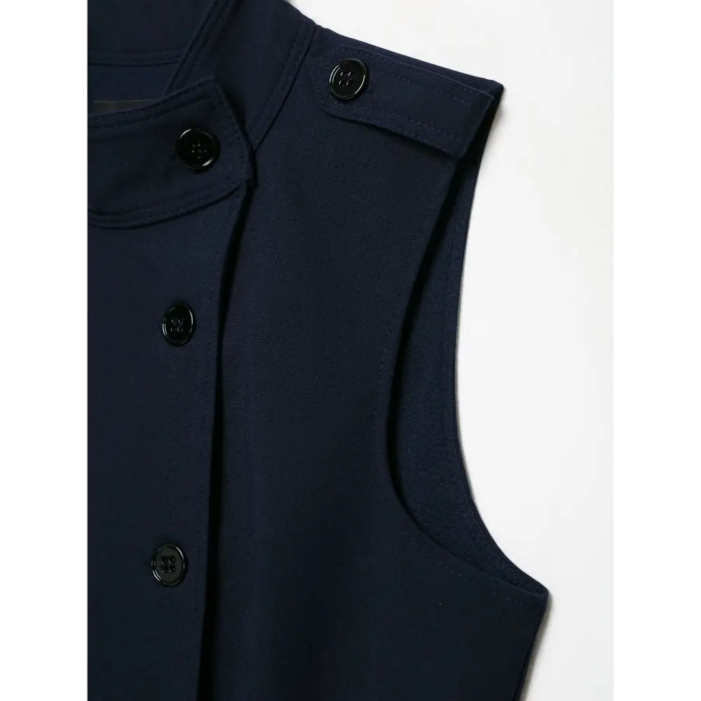 Close-up of armhole, epaulet and button placket