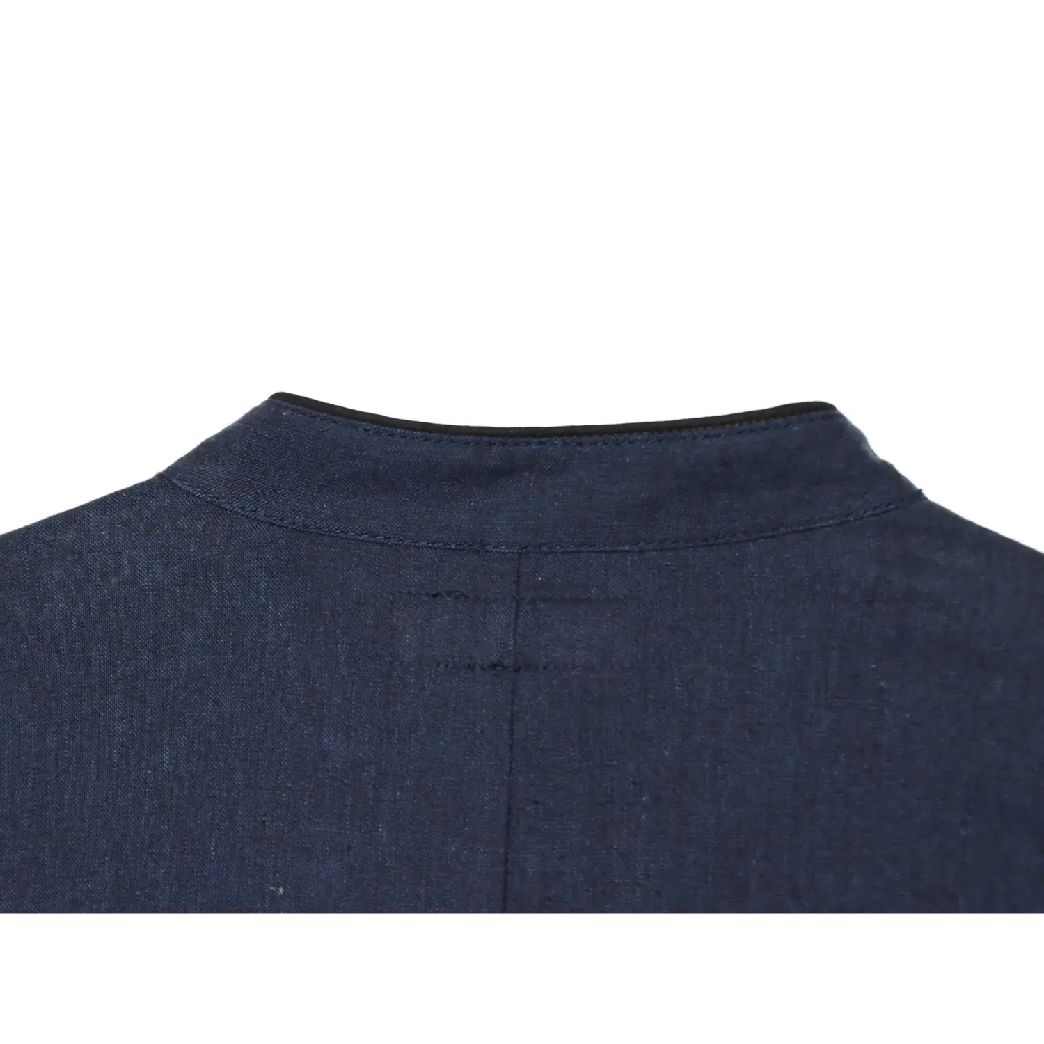Back view close‑up of mandarin collar seam and black piping trim