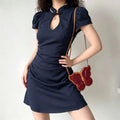 Model wearing navy blue new chinese qipao mini dress, puff short sleeve, side ruched silhouette