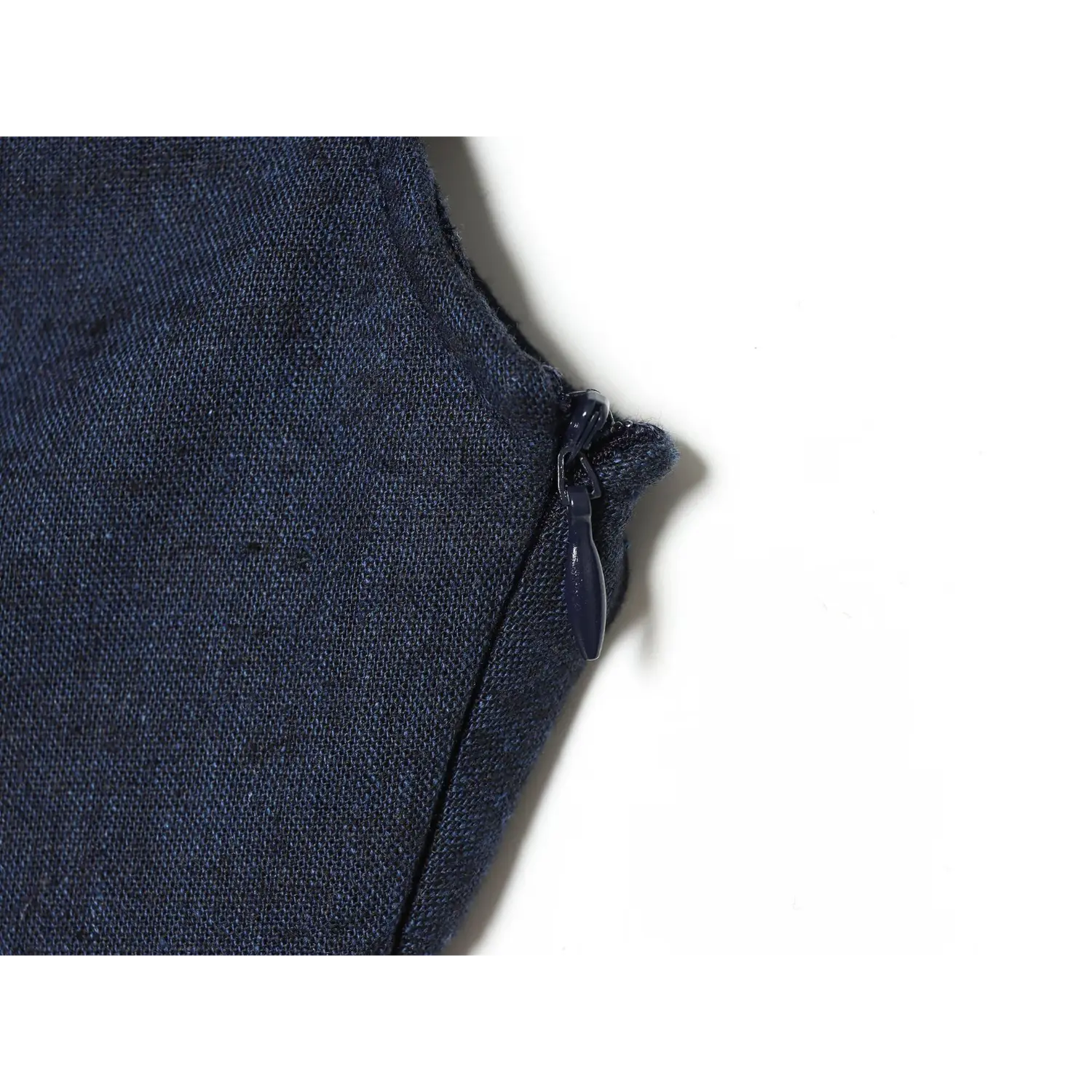 Close‑up of hidden side zipper on navy blue new chinese mini dress