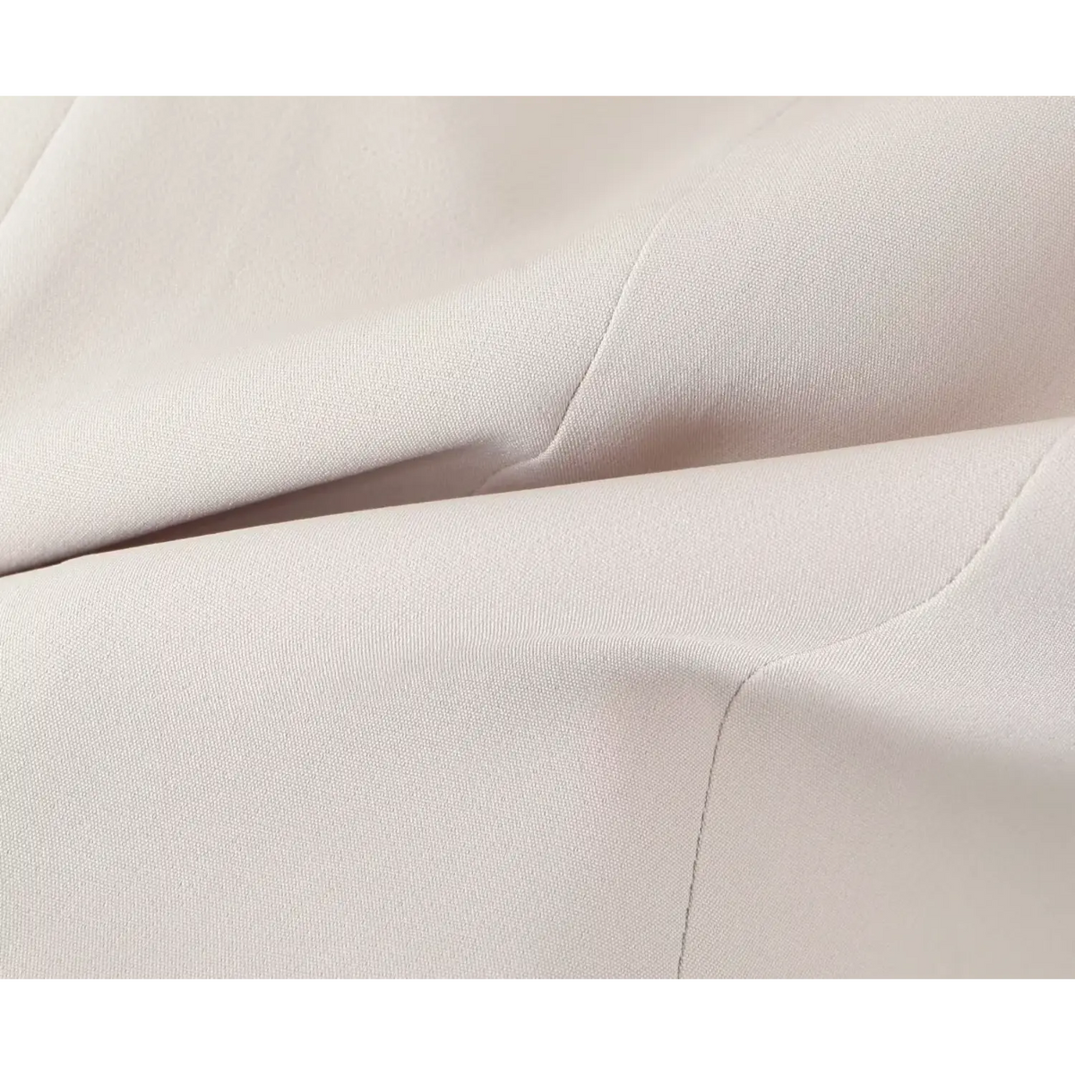 Close-up of ivory woven fabric texture