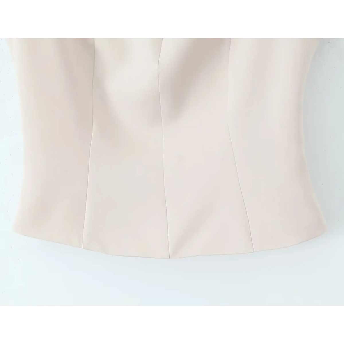 Close-up of ivory princess seam and waist shaping