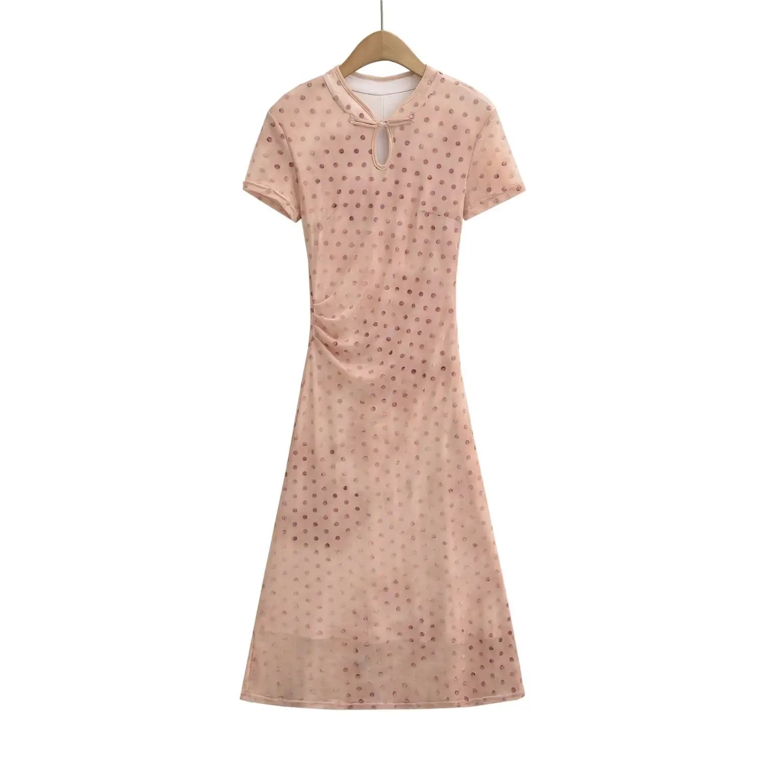 Front full view of nude pink polka dot cheongsam‑style maxi dress with short sleeves