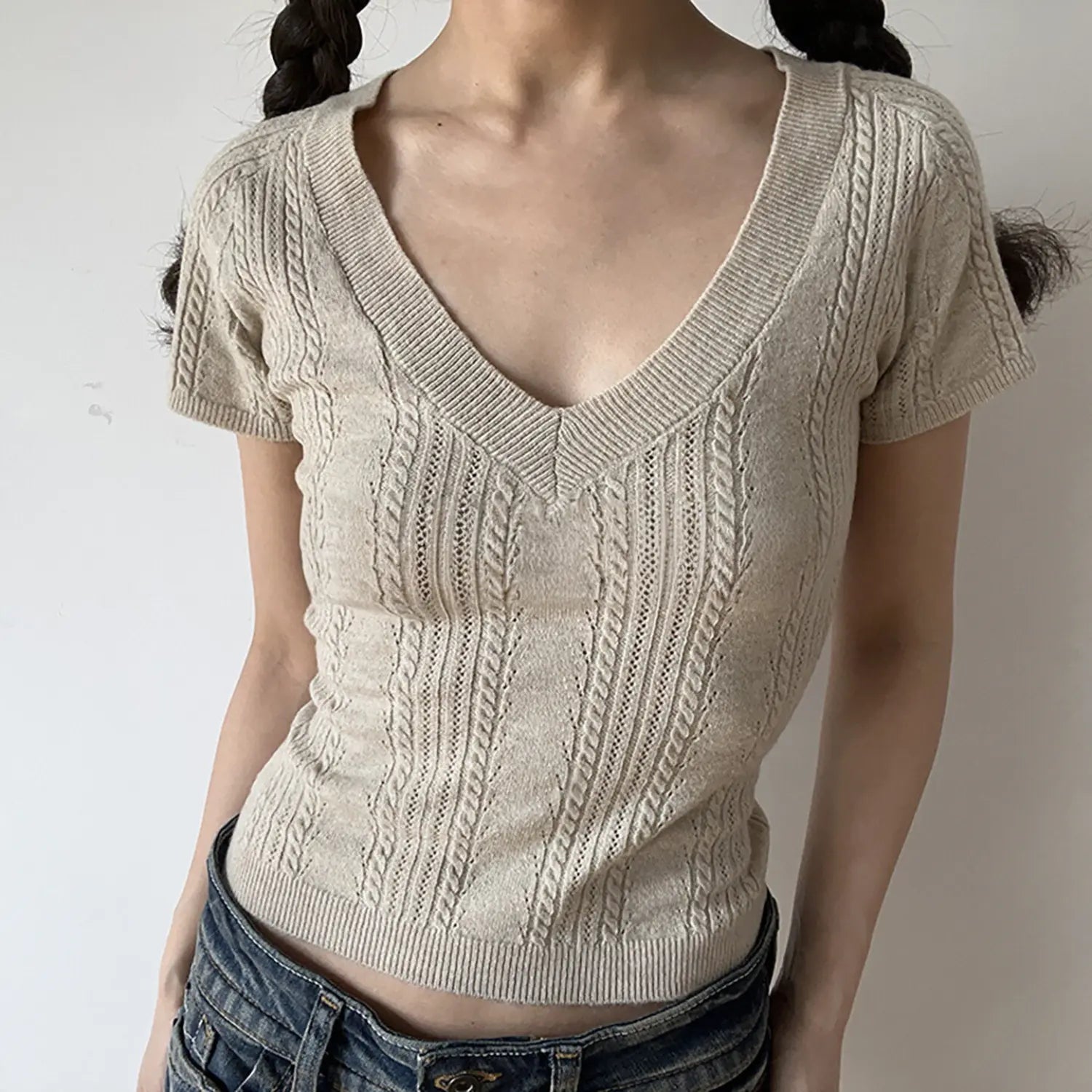 Oat beige deep v neck cable knit cropped short sleeve top, slim stretch rib hem casual women knitwear front shot
