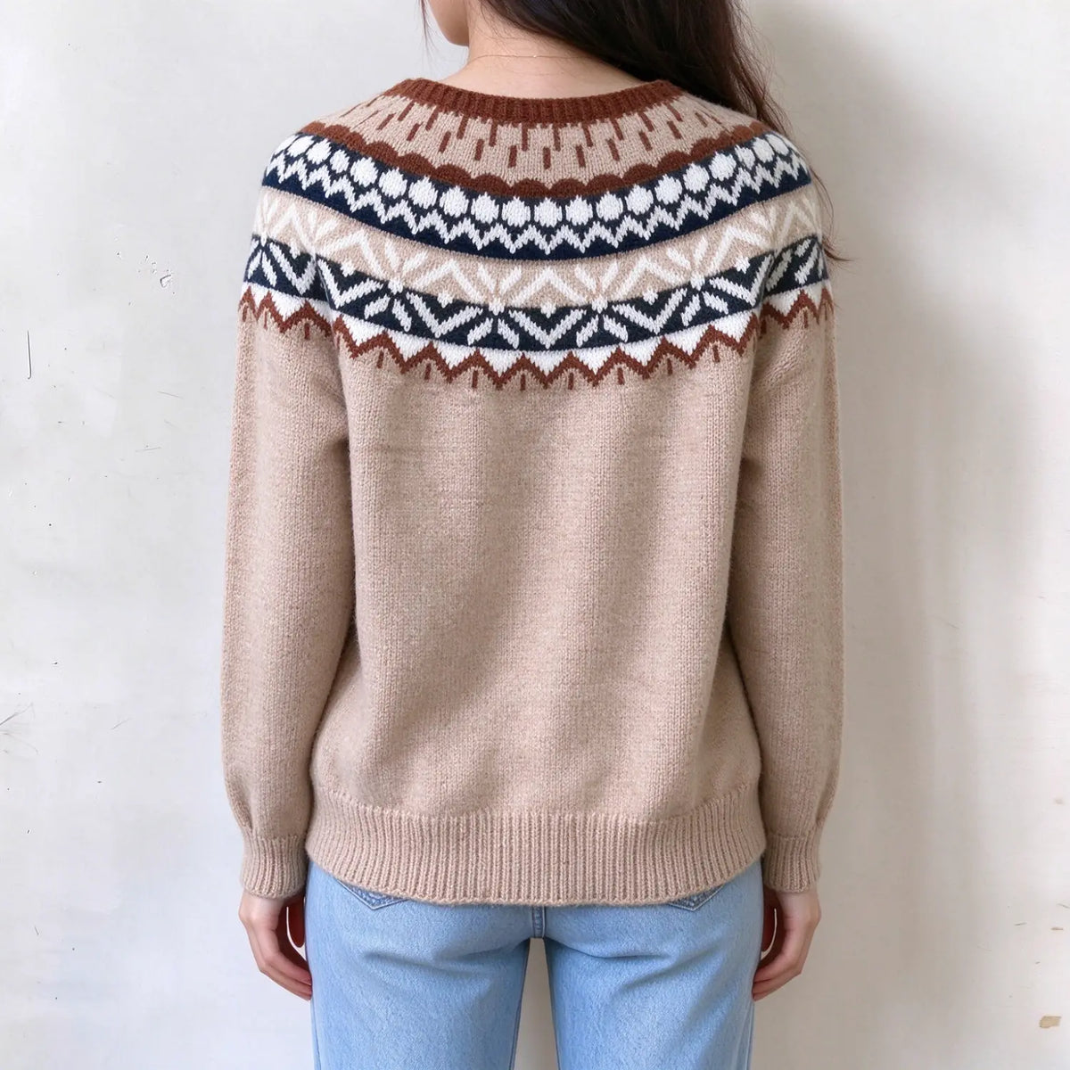 Female model back view, oat beige fairisle yoke knit sweater, multi-layer geometric jacquard pattern around neck, ribbed hem and cuffs