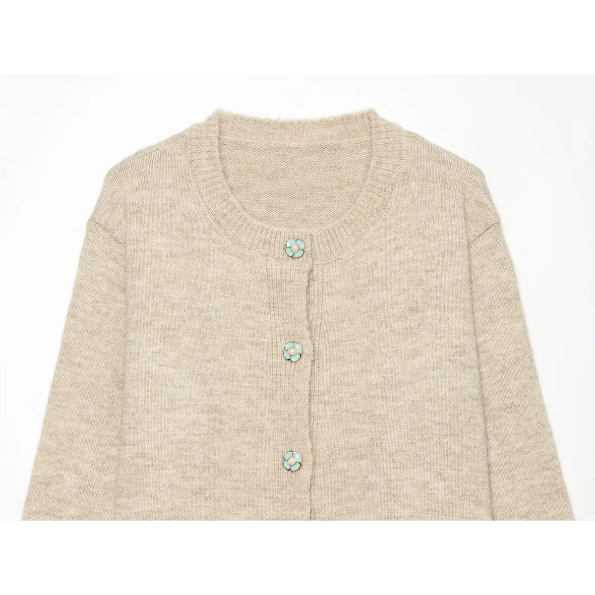 Close-up front shot of oat knit cardigan, round rib neckline, mint green flower shaped pearl buttons