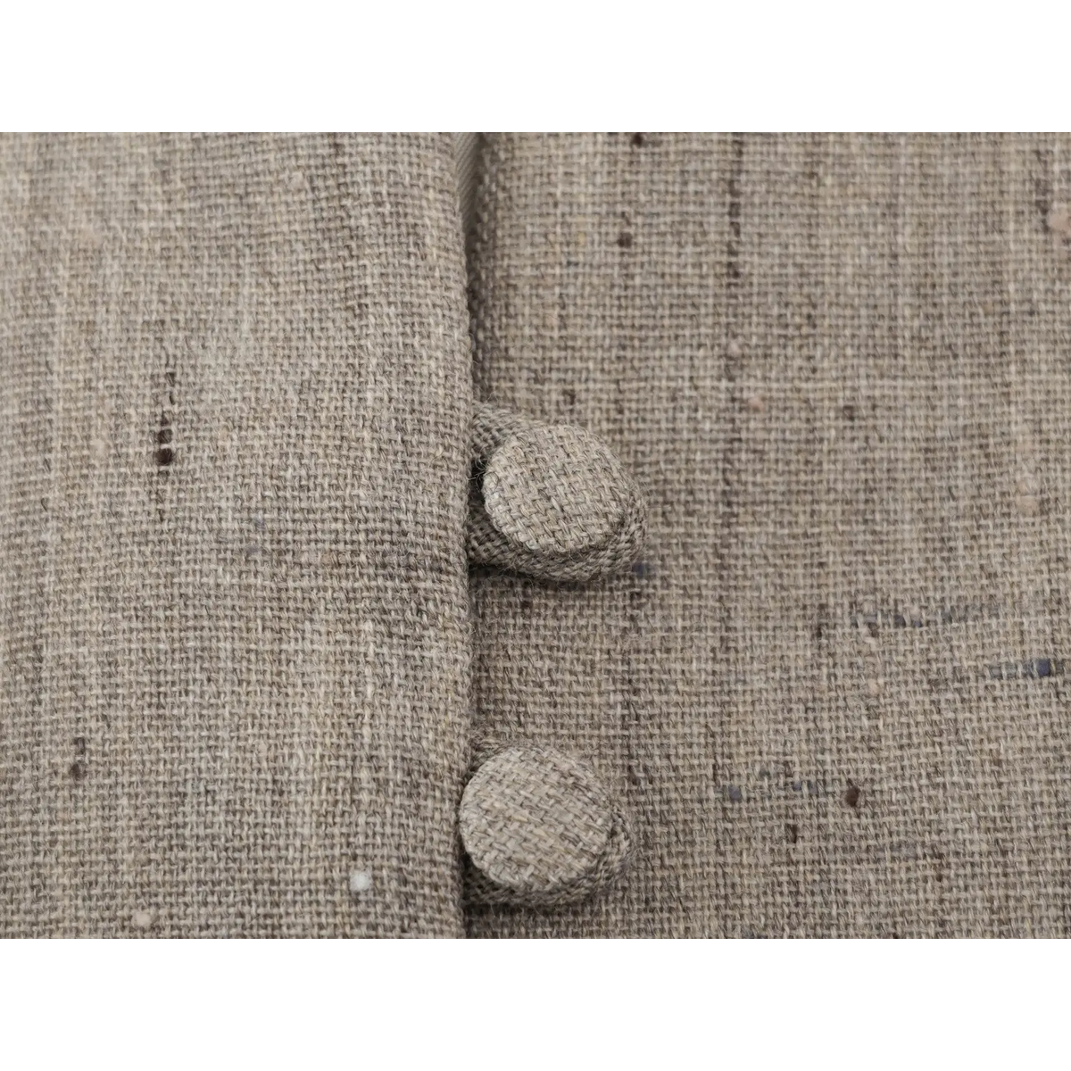 Close-up of fabric covered buttons