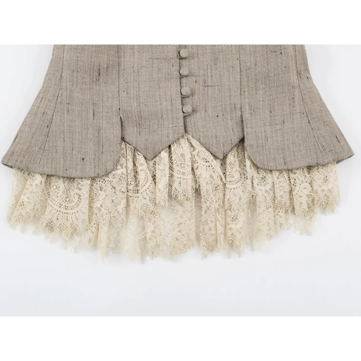 Close-up of lace ruffle hem flat lay