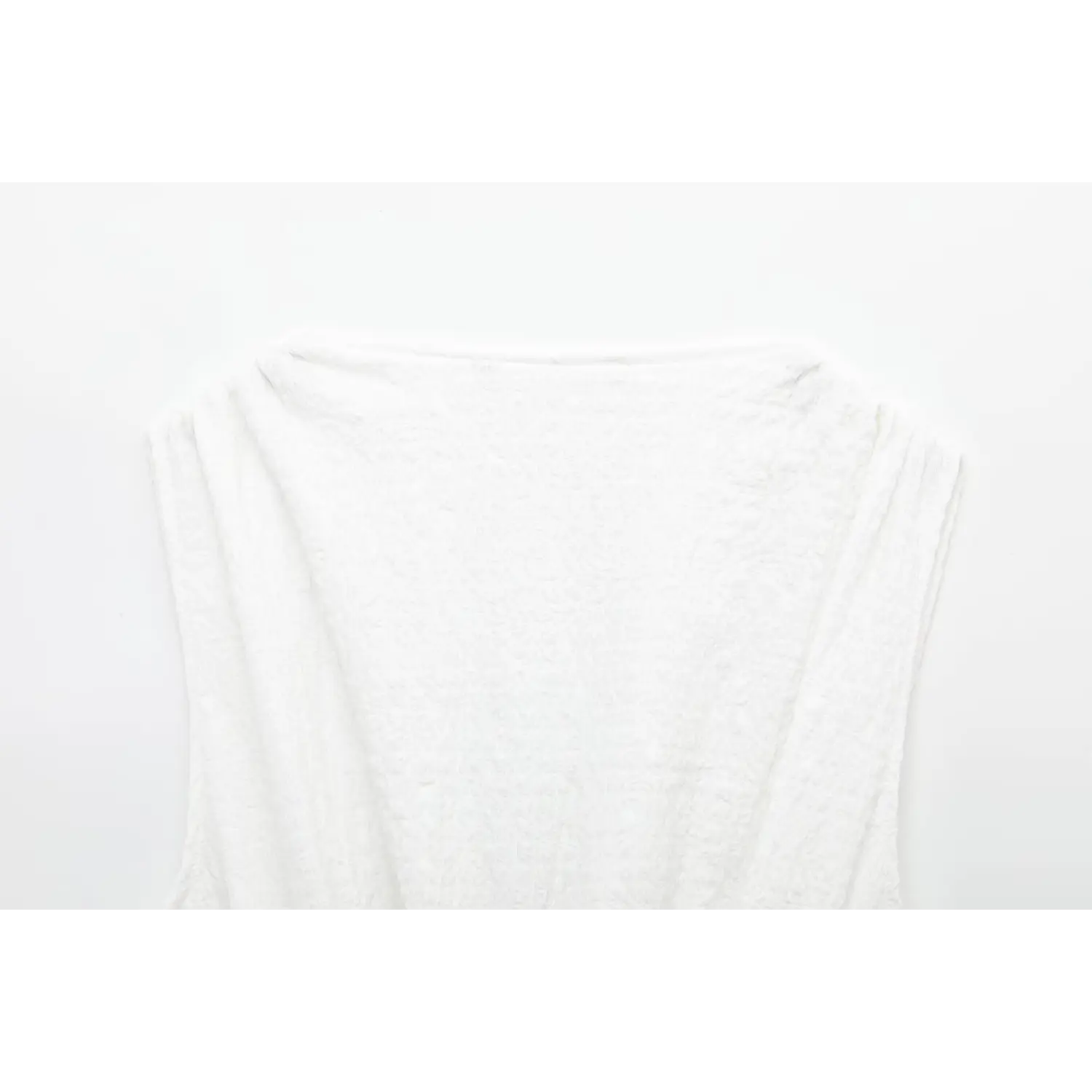 Back view of off-white crinkled bubble fabric sleeveless peplum top showing the neckline